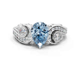 White gold Fancy Blue Pear Cut Diamond Solitaire Ring with Milgrain Pavé Band and Four-Prong Setting_219