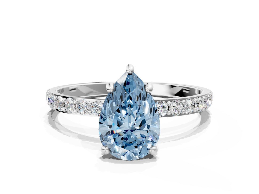 White gold Fancy Blue Pear Cut Diamond Solitaire Ring with Round  Pavé Band and Prong Setting_137