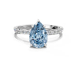 White gold Fancy Blue Pear Cut Diamond Solitaire Ring with Round  Pavé Band and Prong Setting_137