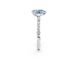 White gold Fancy Blue Pear Cut Diamond Solitaire Ring with Round  Pavé Band and Prong Setting_140