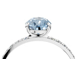 White gold Fancy Blue Pear Cut Diamond Solitaire Ring with Round  Pavé Band and Prong Setting_141