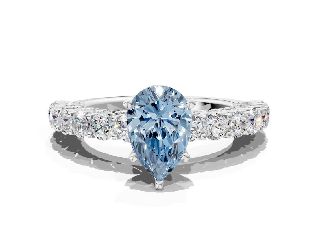 White gold Fancy Blue Pear Cut Diamond Solitaire Ring with Shared Prong Pavé Band and Four-Prong Setting_60