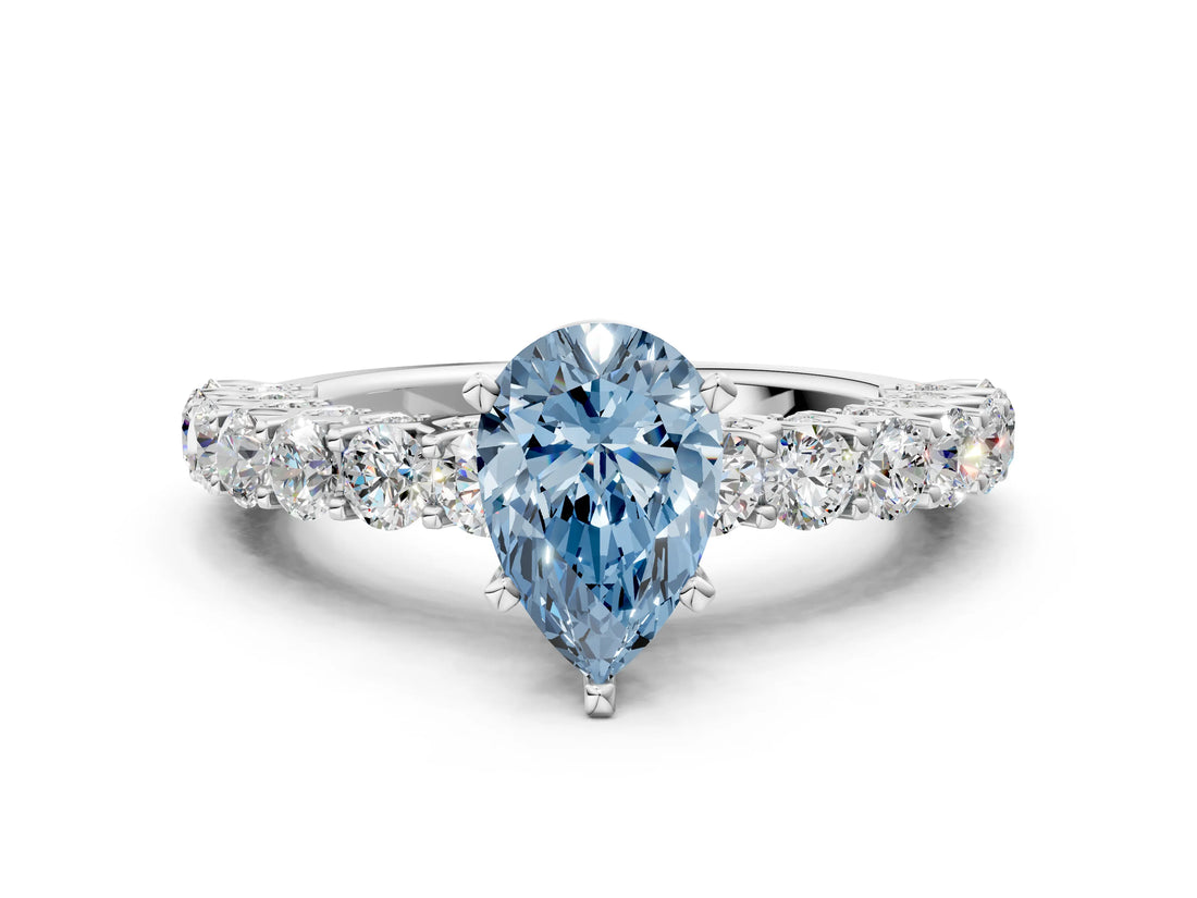 White gold Fancy Blue Pear Cut Diamond Solitaire Ring with Shared Prong Pavé Band and Four-Prong Setting_71