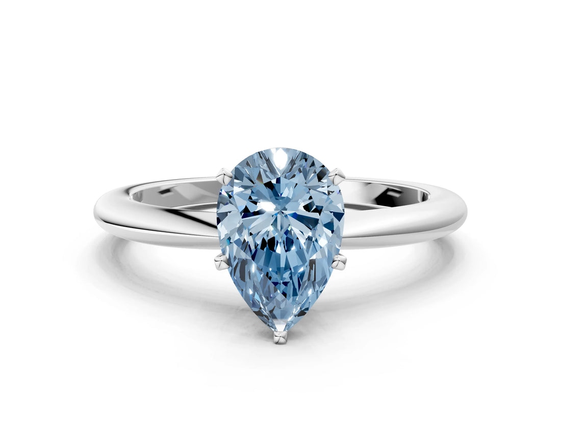 White gold Fancy Blue Pear Cut Diamond Solitaire Ring with Six-Prong Setting and Classic Band_297