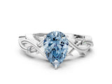 White gold Fancy Blue Pear Cut Diamond Solitaire Ring with Twisted Band and Prong Setting_306