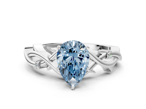 White gold Fancy Blue Pear Cut Diamond Solitaire Ring with Twisted Band and Prong Setting_306