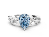 White gold Fancy Blue Pear Cut Diamond Solitaire Ring with Twisted Band and Prong Setting_317