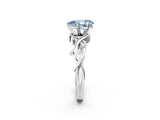 White gold Fancy Blue Pear Cut Diamond Solitaire Ring with Twisted Band and Prong Setting_320
