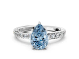 White gold Fancy Blue Pear  Cut Diamond Solitaire with Pave Band and Four-Prong Setting 1
