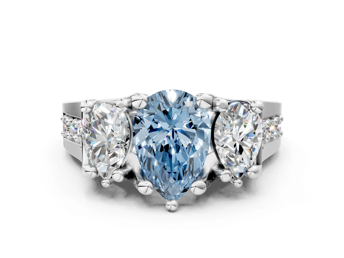 White gold Fancy Blue Pear Cut Diamond Three-Stone Ring with Channel Set Band and Four-Prong Setting_61