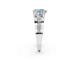 White gold Fancy Blue Pear Cut Diamond Three-Stone Ring with Channel Set Band and Four-Prong Setting_63