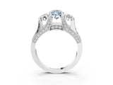 White gold Fancy Blue Pear Cut Diamond Three-Stone Ring with Channel Set Band and Four-Prong Setting_64