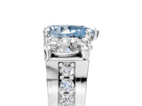 White gold Fancy Blue Pear Cut Diamond Three-Stone Ring with Channel Set Band and Four-Prong Setting_65