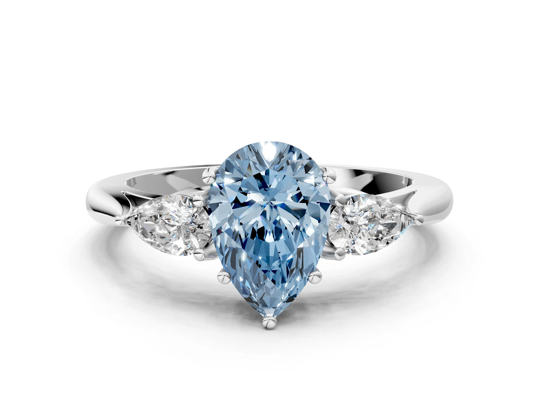 White gold Fancy Blue Pear Cut Diamond Three-Stone Ring with Pear  Side Stones and Prong Setting_139