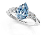 White gold Fancy Blue Pear Cut Diamond Three-Stone Ring with Pear  Side Stones and Prong Setting_140
