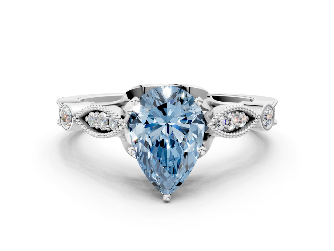 White gold Fancy Blue Pear  Cut Diamond with Milgrain Marquise and Bezel Accents on a Solitaire Band with Prong Setting_240