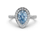 White gold Fancy Blue Pear Cut Halo Diamond Engagement Ring with Split Shank Band and Four-Prong Setting