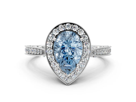 White gold Fancy Blue Pear Cut Halo Diamond Engagement Ring with Split Shank Band and Four-Prong Setting