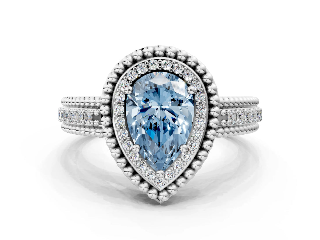 White gold Fancy Blue Pear Cut Halo Diamond Ring with Beaded Split Shank and Four-Prong Setting