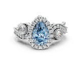 White gold Fancy Blue Pear Cut Halo Diamond Ring with Milgrain and Bezel Accents on a Split Shank Band_12
