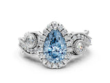 White gold Fancy Blue Pear Cut Halo Diamond Ring with Milgrain and Bezel Accents on a Split Shank Band_12
