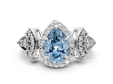 White gold Fancy Blue Pear Cut Halo Diamond Split Shank Engagement Ring with Four-Prong Setting