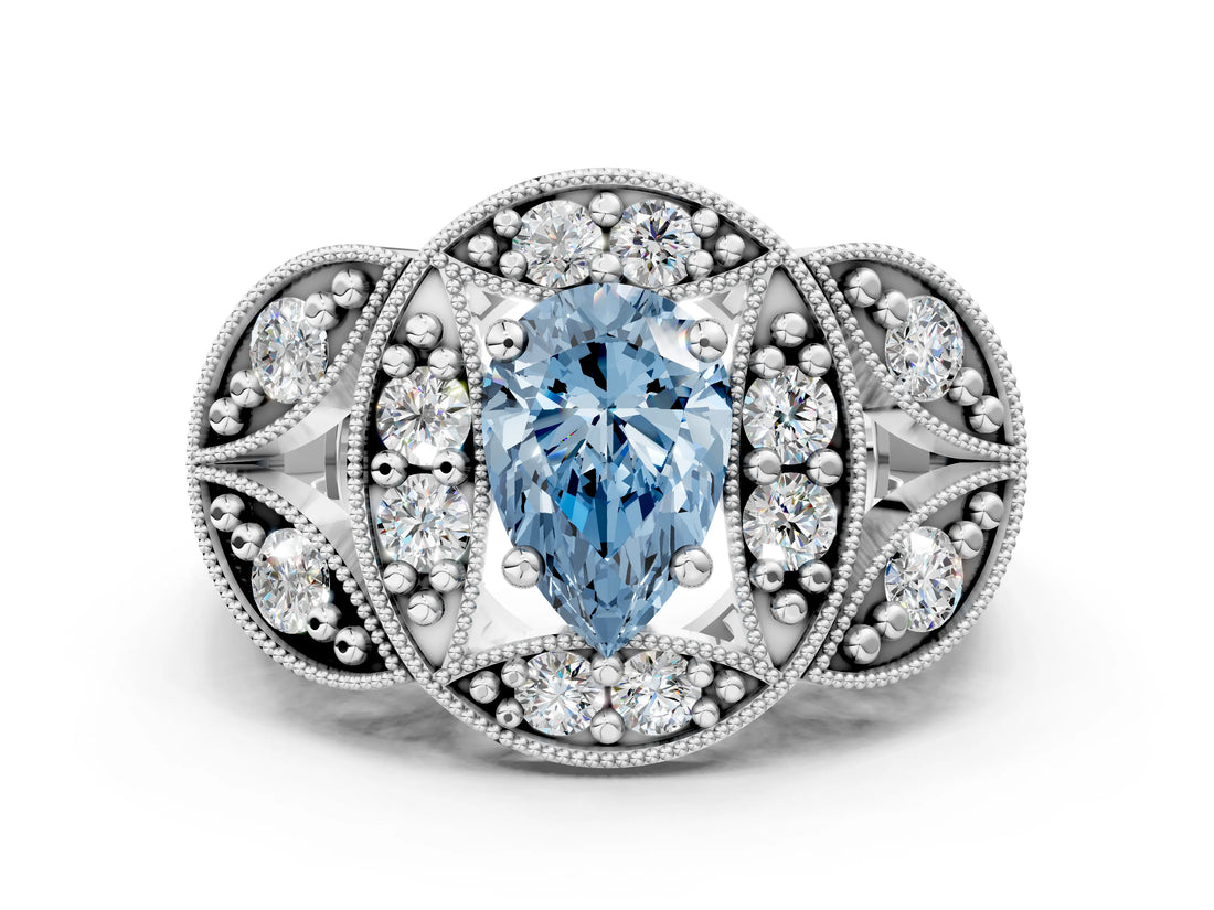 White gold Fancy Blue Pear Cut Halo Milgrain Diamond Engagement Ring with Leaf Band and Four-Prong Setting