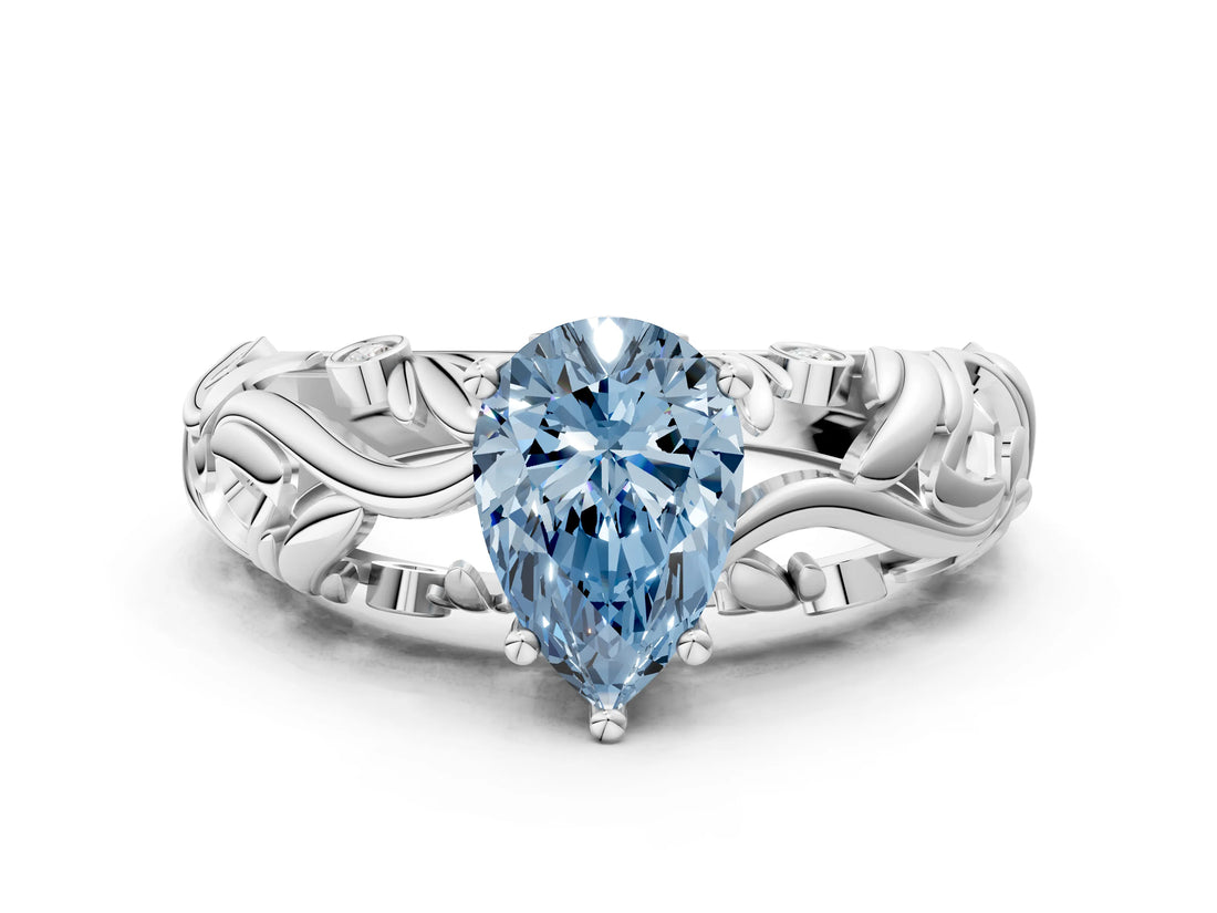 White gold Fancy Blue Pear Cut Solitaire Diamond Leaf-Inspired Vine Band Ring with Prong Setting_45