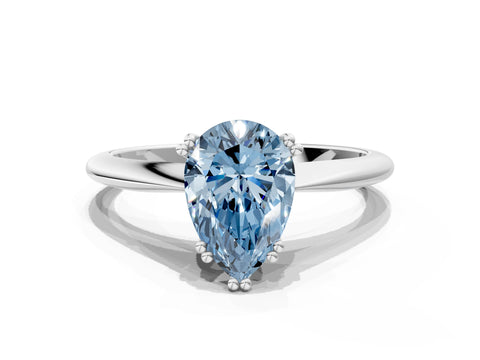 White gold Fancy Blue Pear Cut Solitaire Diamond Ring with Six-Prong Setting and Classic Band