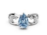 White gold Fancy Blue Pear  Cut Solitaire Diamond with Side Stones on Criss-Cross Band and Four-Prong Setting_3