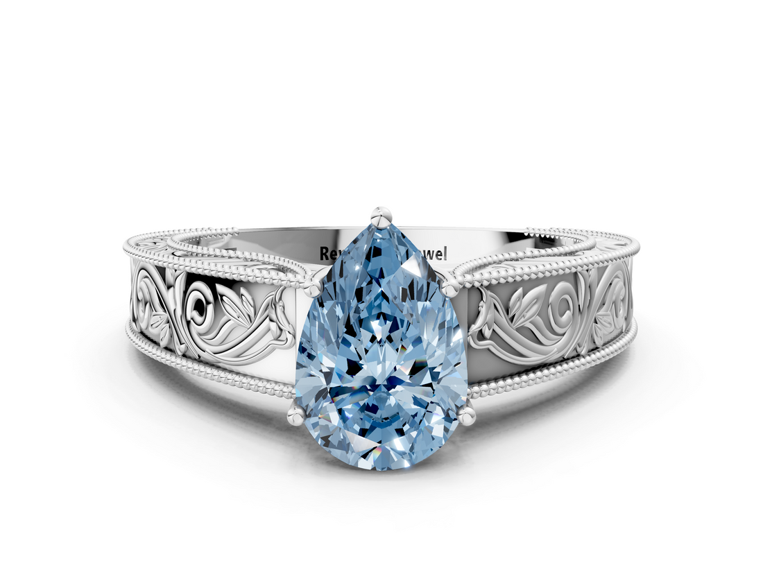 White gold Fancy Blue Pear  Cut Solitaire Engraved Band with Four-Prong Setting_79