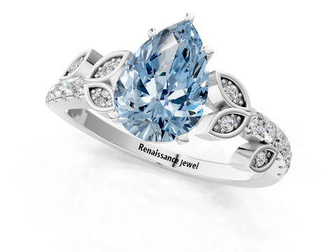 White gold Fancy Blue Pear Cut Solitaire Leaf-Inspired Diamond Ring with Pavé Band and Four-Prong Setting_25