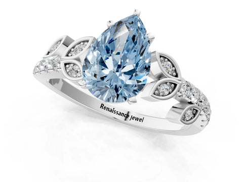 White gold Fancy Blue Pear Cut Solitaire Leaf-Inspired Diamond Ring with Pavé Band and Four-Prong Setting_46