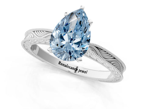 White gold Fancy Blue Pear Cut Solitaire Milgrain Engraved Band with Four-Prong Setting_1