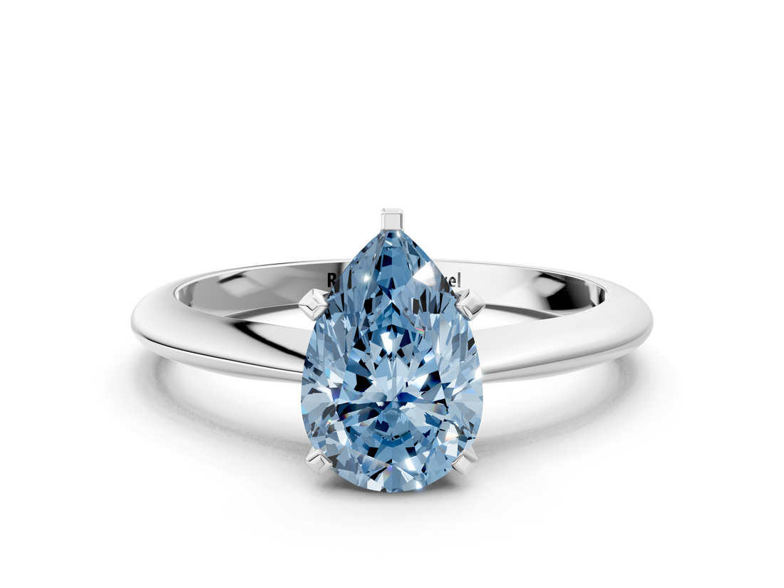 White gold Fancy Blue Pear  Cut Solitaire Ring with Four-Prong Setting on a Classic Band_41