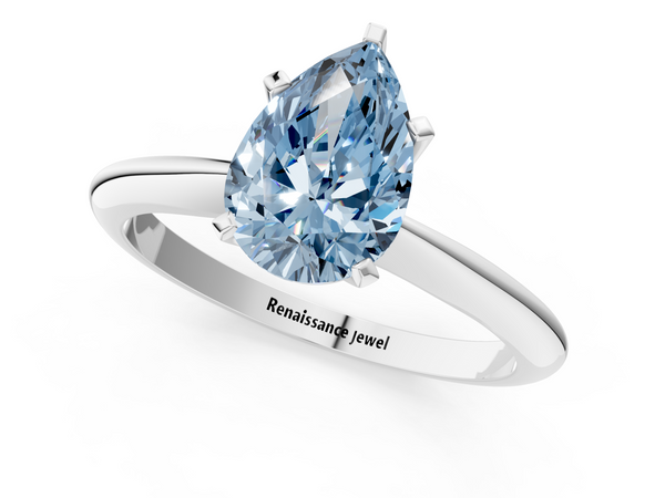 White gold Fancy Blue Pear  Cut Solitaire Ring with Four-Prong Setting on a Classic Band