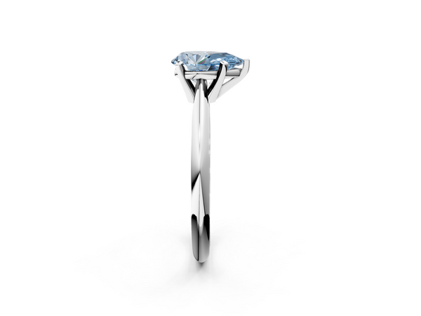White gold Fancy Blue Pear  Cut Solitaire Ring with Four-Prong Setting on a Classic Band