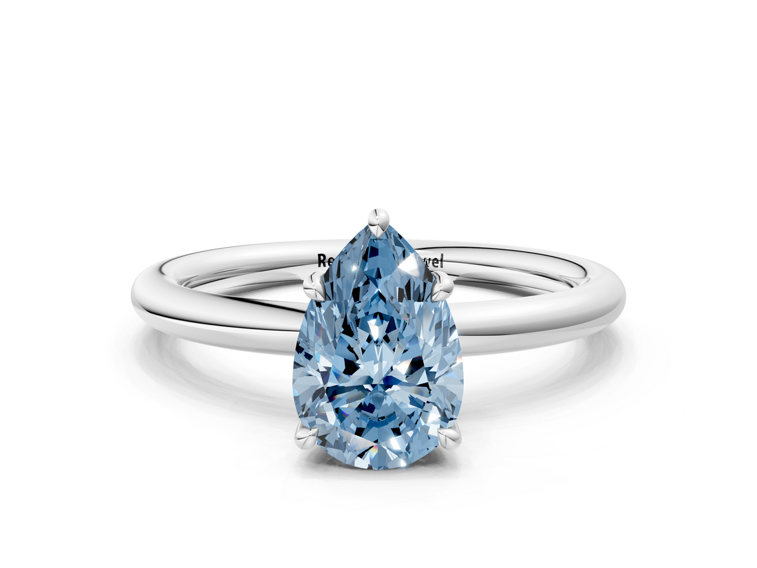 White gold Fancy Blue Pear  Cut Solitaire Ring with Thin Band and Four-Prong Setting_16