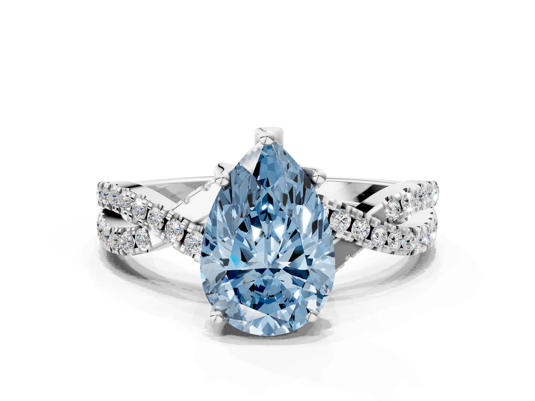 White gold Fancy Blue Pear Cut Solitaire Twist Pave Diamond Engagement Ring with Prong Setting