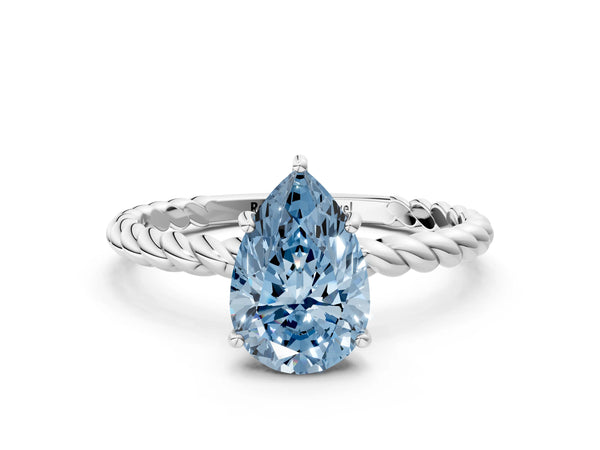 Platinum Fancy Blue Pear Cut Solitaire Twisted Band 4-Prong Ring