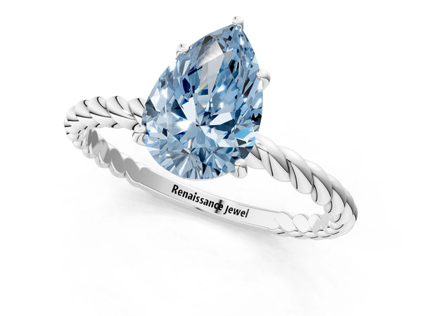 Platinum Fancy Blue Pear Cut Solitaire Twisted Band 4-Prong Ring
