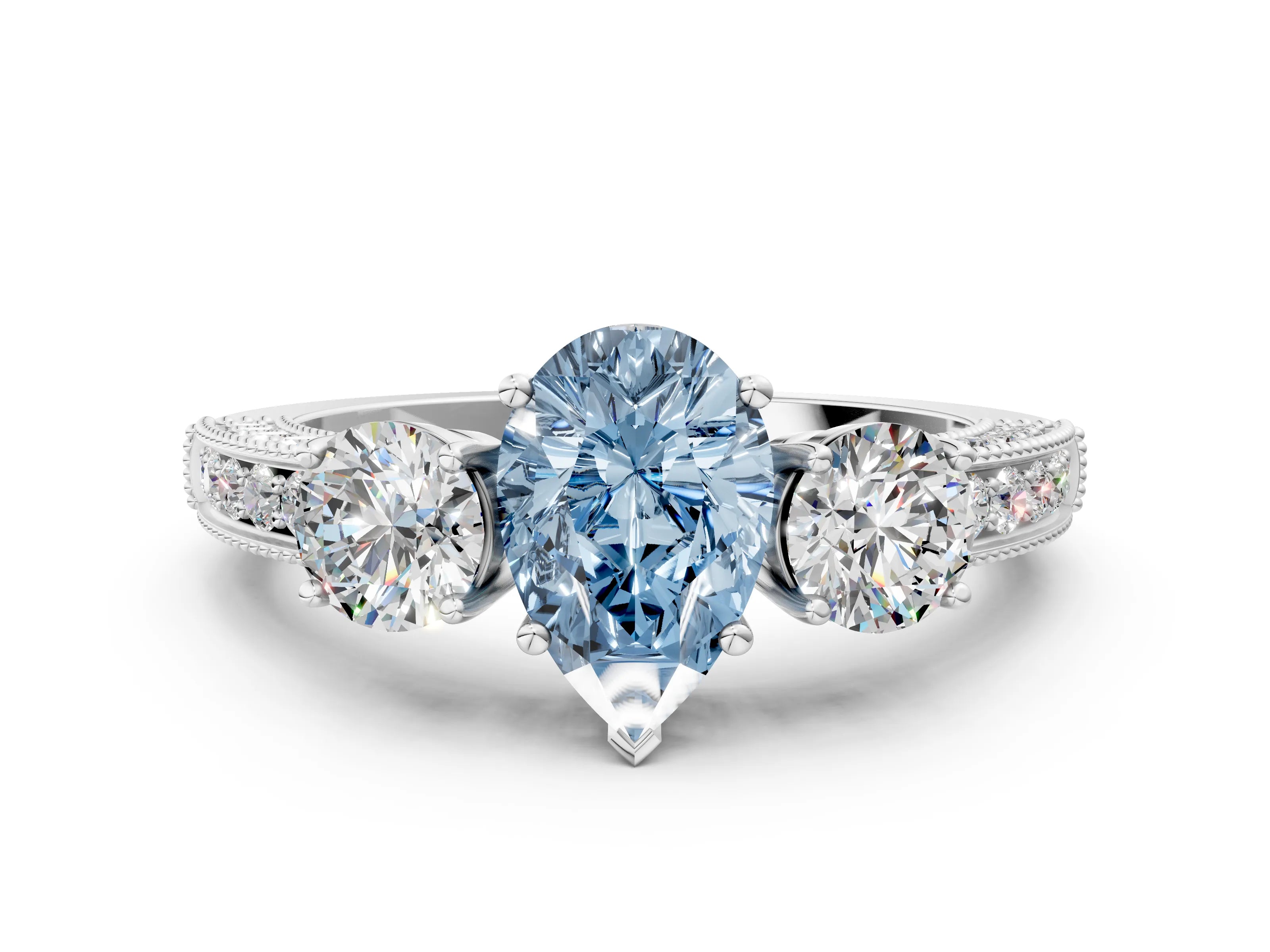White gold Fancy Blue Pear Cut Three-Stone Diamond Ring with Pavé Band and Four-Prong Setting