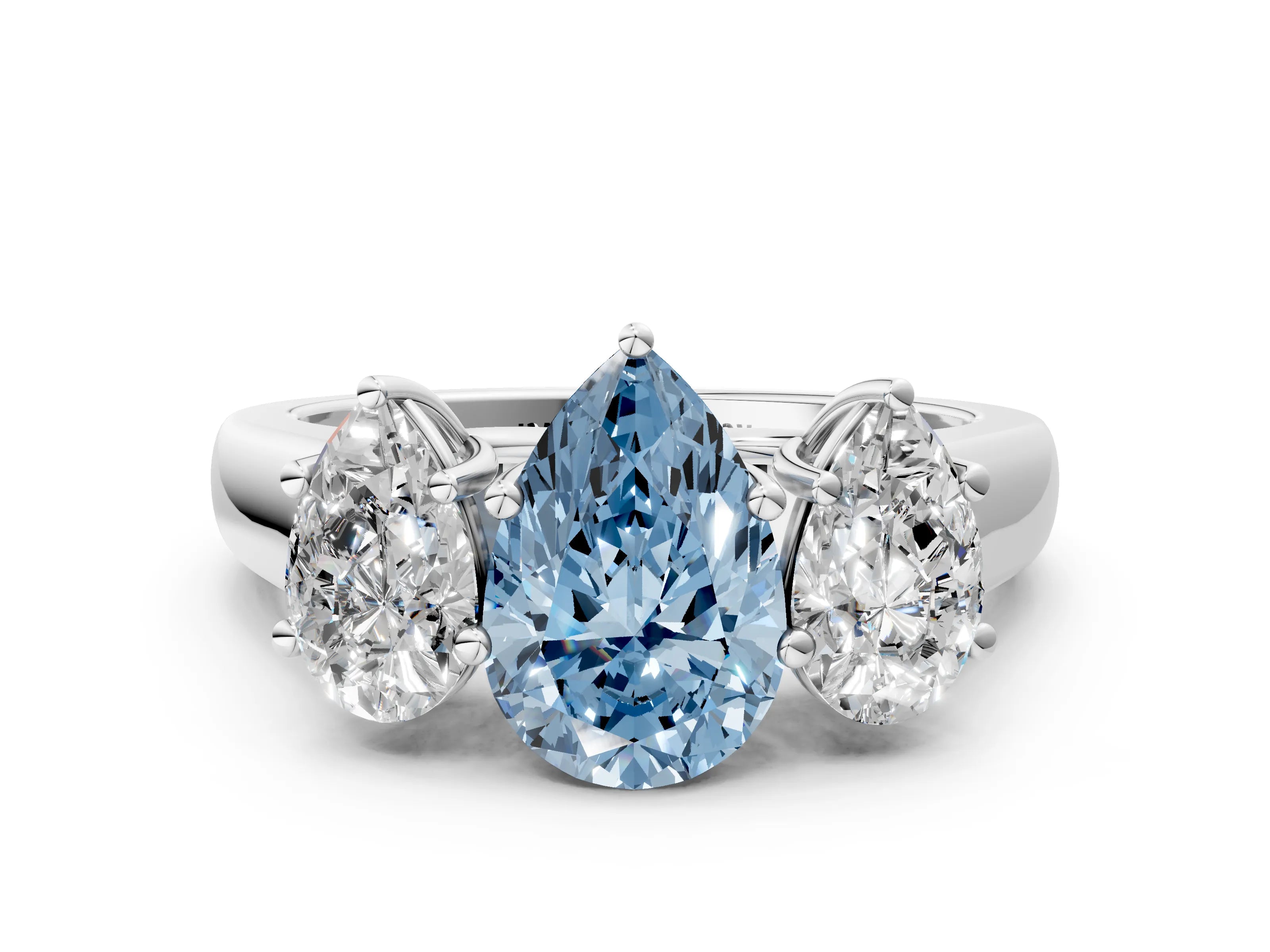 White gold Fancy Blue Pear Cut Three-Stone Diamond Ring with Prong Setting on a Classic Band