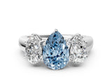 White gold Fancy Blue Pear Cut Three-Stone Diamond Ring with Prong Setting on a Classic Band_24