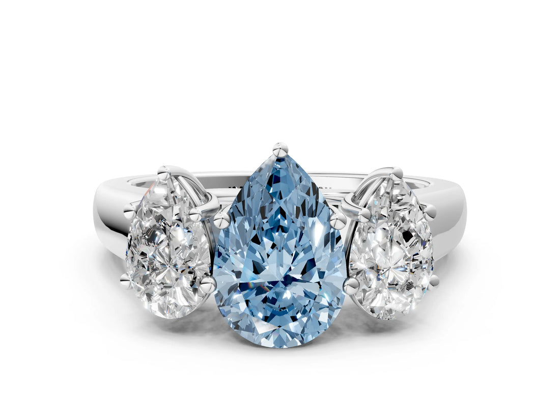 White gold Fancy Blue Pear Cut Three-Stone Diamond Ring with Prong Setting on a Classic Band_24