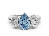 White gold Fancy Blue Pear Cut Three-Stone Diamond Ring with Prong Setting on a Classic Band_24