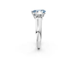 White gold Fancy Blue Pear Cut Three-Stone Diamond Ring with Prong Setting on a Classic Band_26
