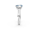White gold Fancy Blue Pear Cut Three-Stone Diamond Ring with Prong Setting on a Classic Band_26