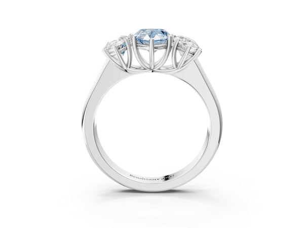 White gold Fancy Blue Pear Cut Three-Stone Diamond Ring with Prong Setting on a Classic Band