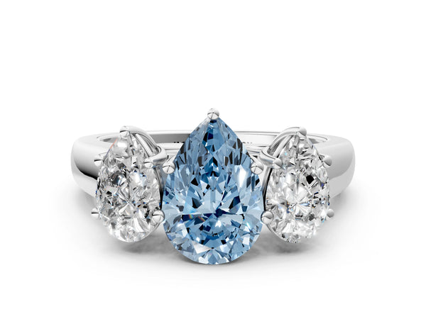 White gold Fancy Blue Pear Cut Three-Stone Diamond Ring with Prong Setting on a Classic Band